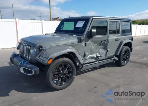 2022 Jeep Wrangler 4Xe Unlimited Sahara 4X4 from USA, damaged, VIN 1C4JJXP66NW280922